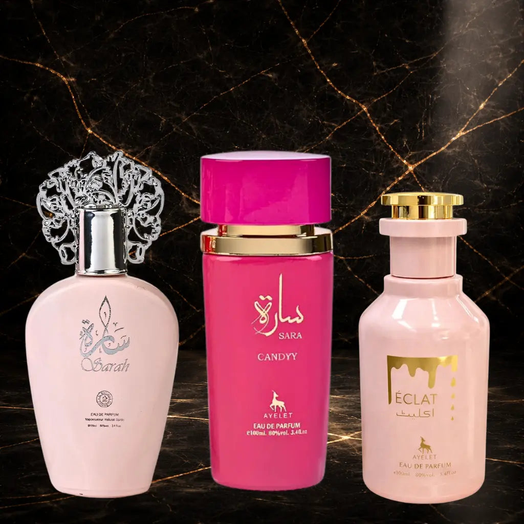 Set of three women's oriental perfumes including Sarah, Sara Candy, and Eclat by ZEIRA, featuring elegant perfume bottles on display.