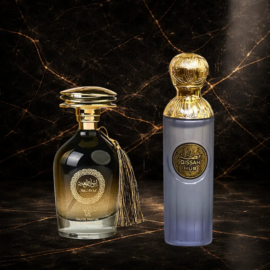 Set of two oriental men's perfumes by ZEIRA, featuring Ibda Al Oud and Qissah Hub Grey, displayed in elegant bottles.