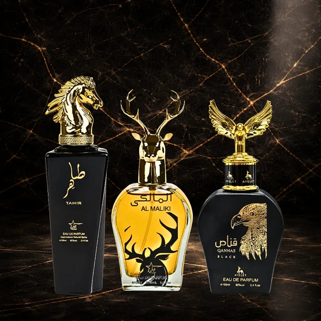 Set of three oriental men's perfumes by ZEIRA, including Tahir, Al Maliki, and Qannas Black bottles.