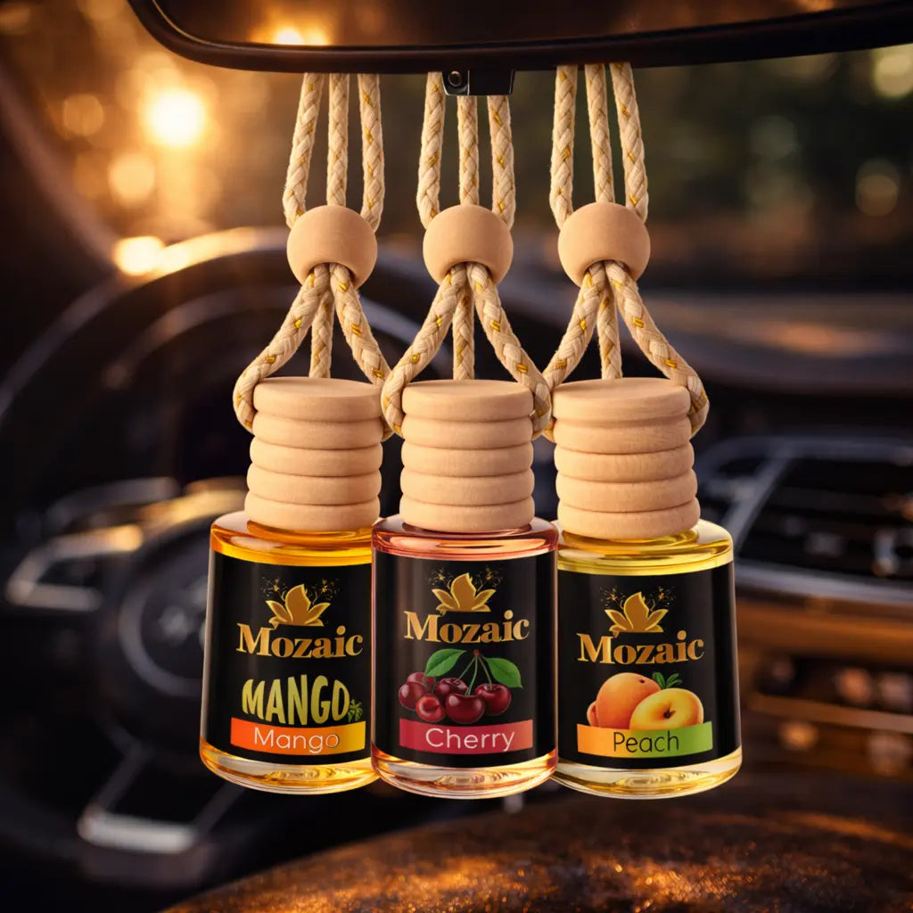 Set of three ZEIRA auto odorizer air fresheners with mango, cherry, and peach scents in colorful packaging.