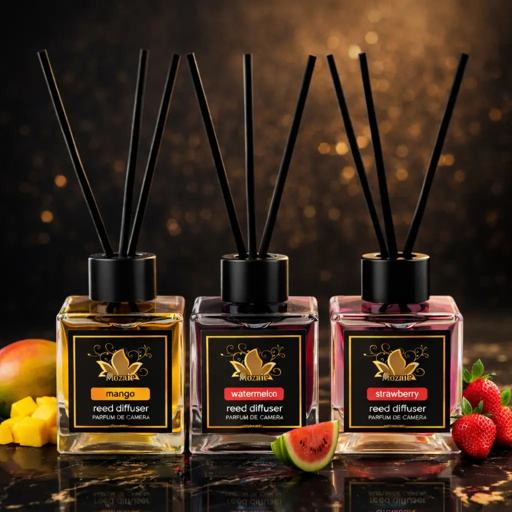 Set of three ZEIRA ambient perfumes with mango, watermelon, and strawberry scents, displayed in elegant bottles.